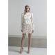 BLUSA CON ESPALDA AL AIRE Y CUELLO